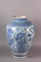 A JAPANESE ARITA VASE, having an everted rim, the ovoid body painted with flowering prunus and