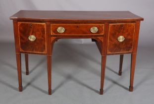 A LATE GEORGE III MAHOGANY AND SATINWOOD BANDED SIDEBOARD of bowed outline, having a drawer to the