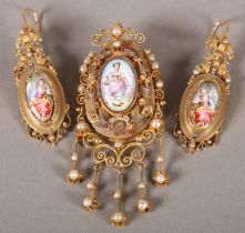A MID TO LATE 19TH CENTURY FRENCH ENAMEL PORTRAIT AND SEED PEARL DEMI PARURE, in 18ct gold, of ear