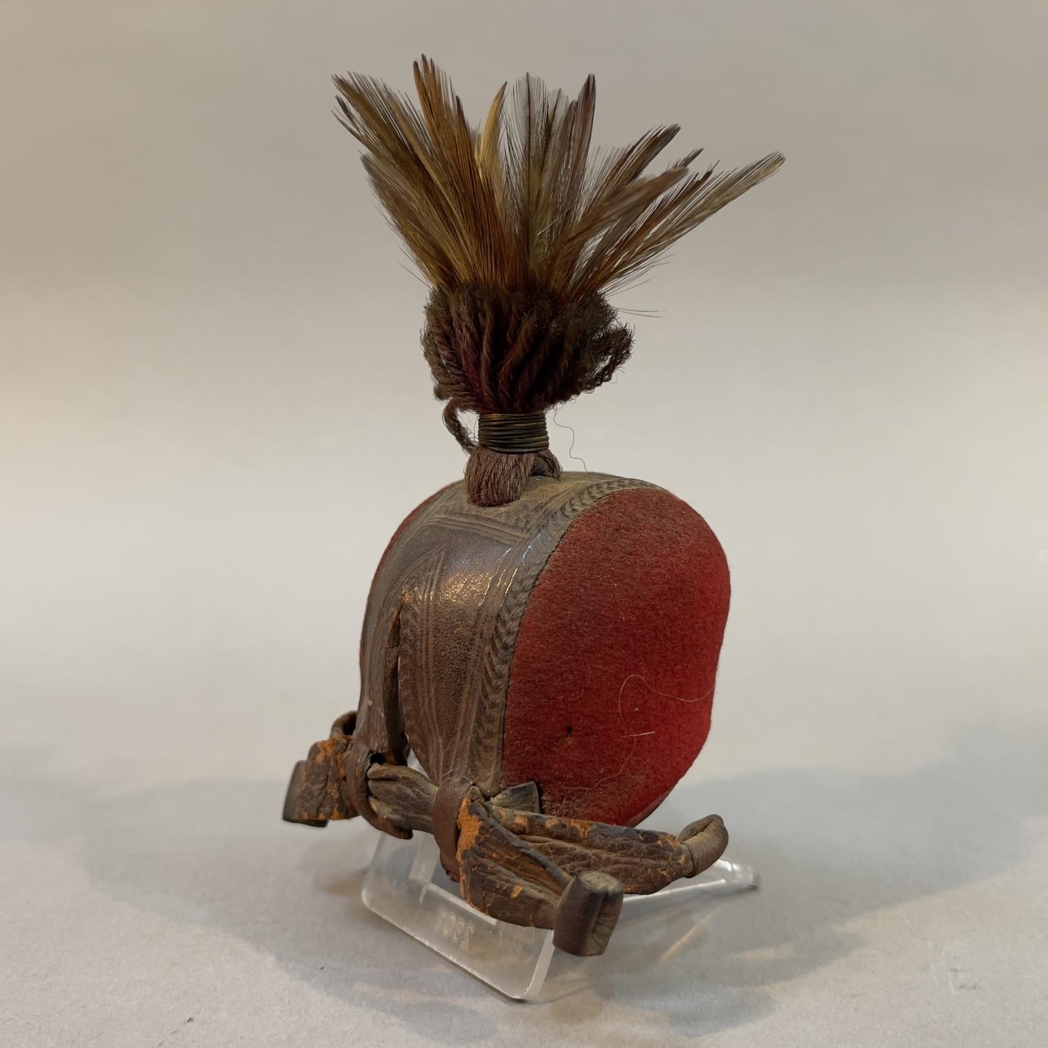 A 19TH/EARLY 20TH CENTURY DUTCH FALCONRY HOOD, fashioned from leather with tooled borders and red - Image 2 of 3