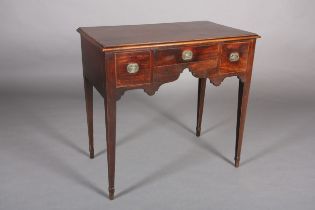 A LATE GEORGE III MAHOGANY SIDE TABLE, the ogee arched apron fitted with three small drawers