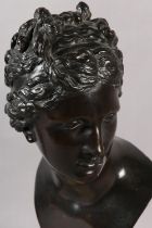 AN 19TH CENTURY BRONZE BUST OF A CLASSICAL FEMALE, after the antique, on marble socle, 49cm high