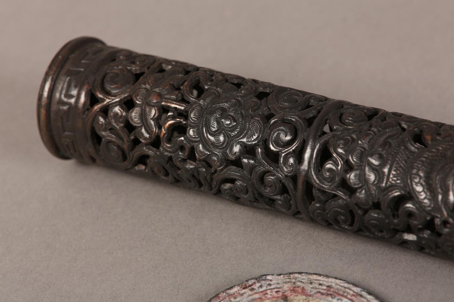 A TIBETAN COPPER INCENSE HOLDER of cylindrical, form and pierced scrolling tendrils, 21cm long - Image 3 of 4
