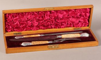 A LATE VICTORIAN SILVER MOUNTED ANTLER HANDLE CARVING SET by F T Depree, Silversmith, Exeter, the