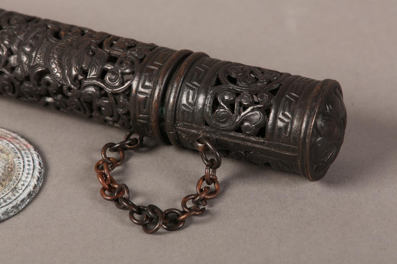A TIBETAN COPPER INCENSE HOLDER of cylindrical, form and pierced scrolling tendrils, 21cm long - Image 4 of 4