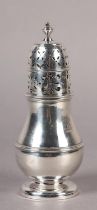 A GEORGE I SILVER CASTER, London 1716, the baluster body engraved with a crest, on raised circular