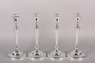 A SET OF FOUR GEORGE III SILVER CANDLESTICKS, Sheffield 1793, for John Green, Roberts, Mosley & Co