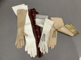 Five pairs of evening and long length gloves, two with metallic thread decoration
