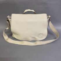 A Gucci Soho taupe leather baby changing bag, having a cloth shoulder strap, front flap with Gucci