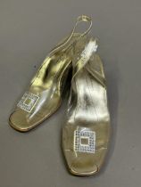 Brenda Zaro, Spain, a pair of clear sided Perspex type evening shoes with gold sling-backs and