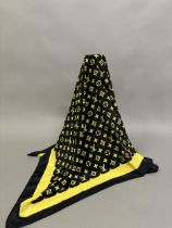 A Louis Vuitton silk scarf monogrammed design in black and yellow