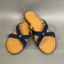 Fairfax and Favor, luxury Lifestyle Brand: A pair of navy suede sandals, model Holkham, with cross-
