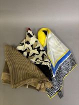 A Balenciaga silk scarf with flower design in blues, and yellows with polka dot border, another