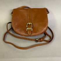 Barbour: a tan Laure Saddle bag, with brass effect buckle, snap closure, adjustable leather shoulder