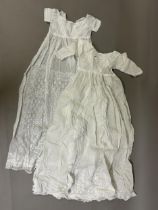 Two good Victorian christening gowns with long embroidered skirt fronts, the first in very fine