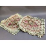 A pair of Chelsea Textile petit and gros point cushions, roses and summer blooms within a scrollwork