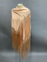 Am apricot silk piano shawl with long fringe, approximate 116cm square excluding fringe two holes