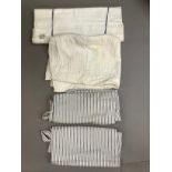 A cotton sheet, circa 1940 - early 50's, unused, double size, pair ticking storage bags, piece of