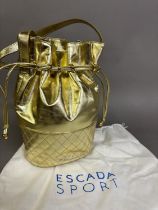 Escada Italy gold bucket bag with quilted base, the top having a gathered drawstring with shoulder