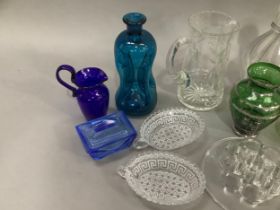 A collection of glass including moulded vases, Bristol blue etc