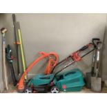 A Bosch electric lawn mower, Flymo strimmer and together with other gardening tools