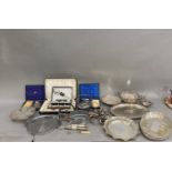 A collection of silver plated ware comprising an oval etched tray with galleried rim, another oval