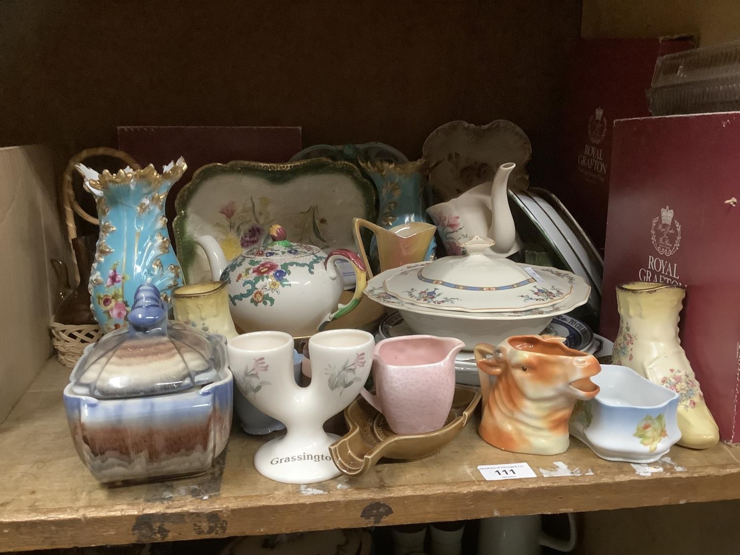 A collection of ceramics comprising moulded plates, Royal Grafton boxed plates, an Ironstone teapot,