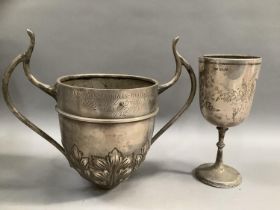 A Victorian silver trophy goblet, London 1895 Josiah Williams and CO, foliate chased cup with