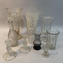Two cut glass vases 33cm high, two further glass vases of wrythen form, a small decanter and stopper