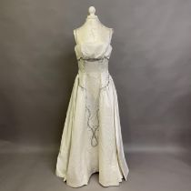 Olive Moore of Glasgow - An ivory satin evening gown with applied diamante beading to shoestring