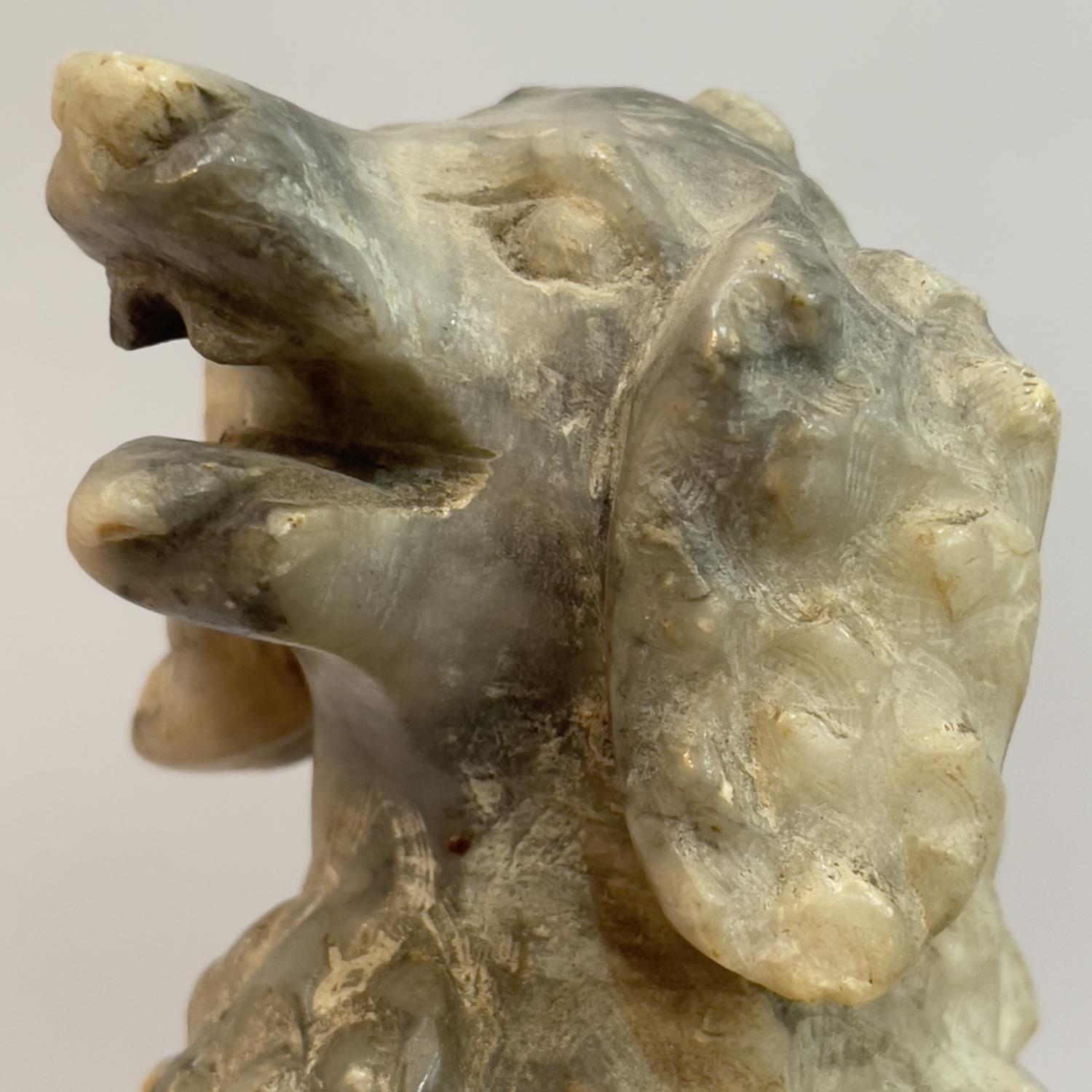 An alabaster carved figure of a poodle, mouth open, upon plinth on ebonised base, 19cm high - Image 2 of 2