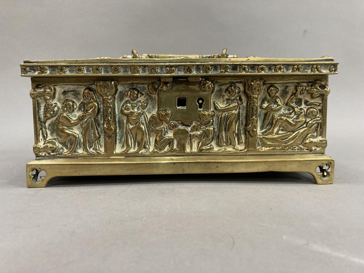 A Victorian brass casket cask with figures of saints within trefoil arches and similar to each - Image 2 of 3