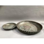 A large, shallow bronze dish with scalloped edge, etched to the exterior 62cm diameter and another