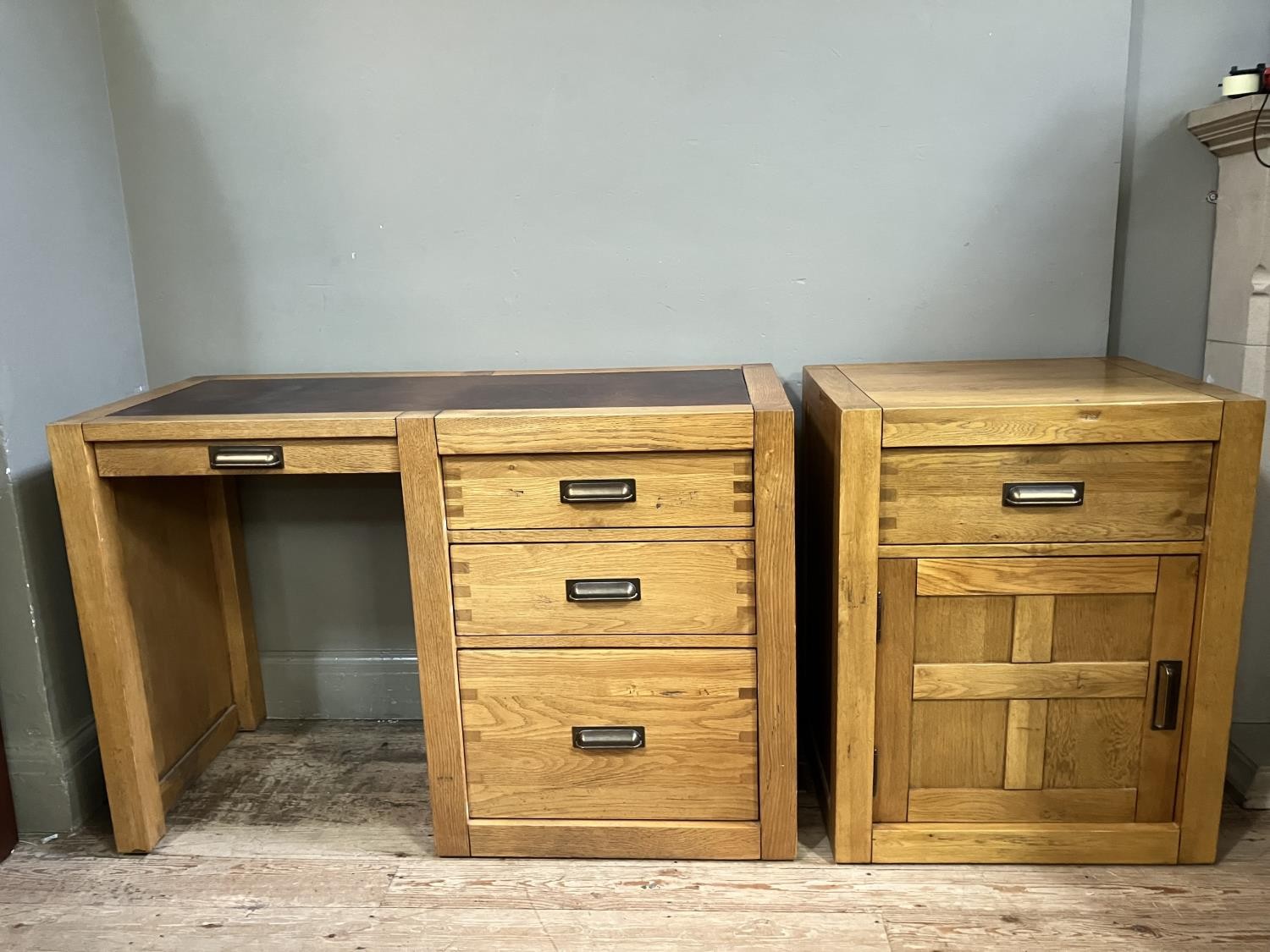 AN elm desk having an incised writing surface with narrow drawer to the kneehole flanked by two - Image 4 of 4