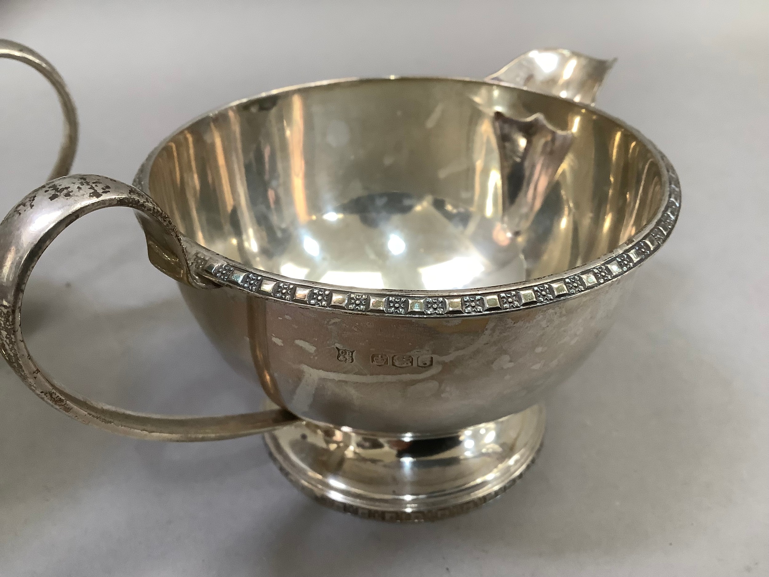 A Queen Elizabeth II silver cream jug, sugar bowl, Sheffield 1960 for Cooper Brothers and Sons, of - Image 2 of 2