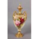 A Royal Worcester urn-shape vase and over painted by W H Austin with red and pink roses, signed