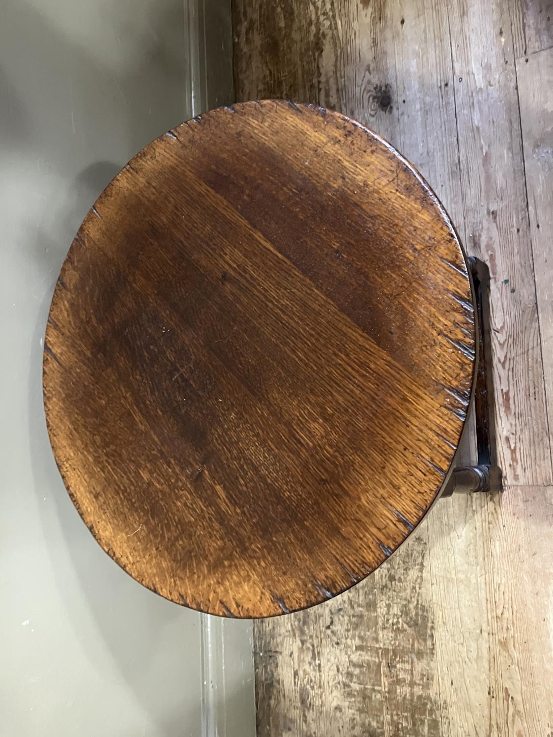 A Titchmarsh and Goodwin oak occasional table, circular outline on turned legs joined by a square - Image 2 of 3