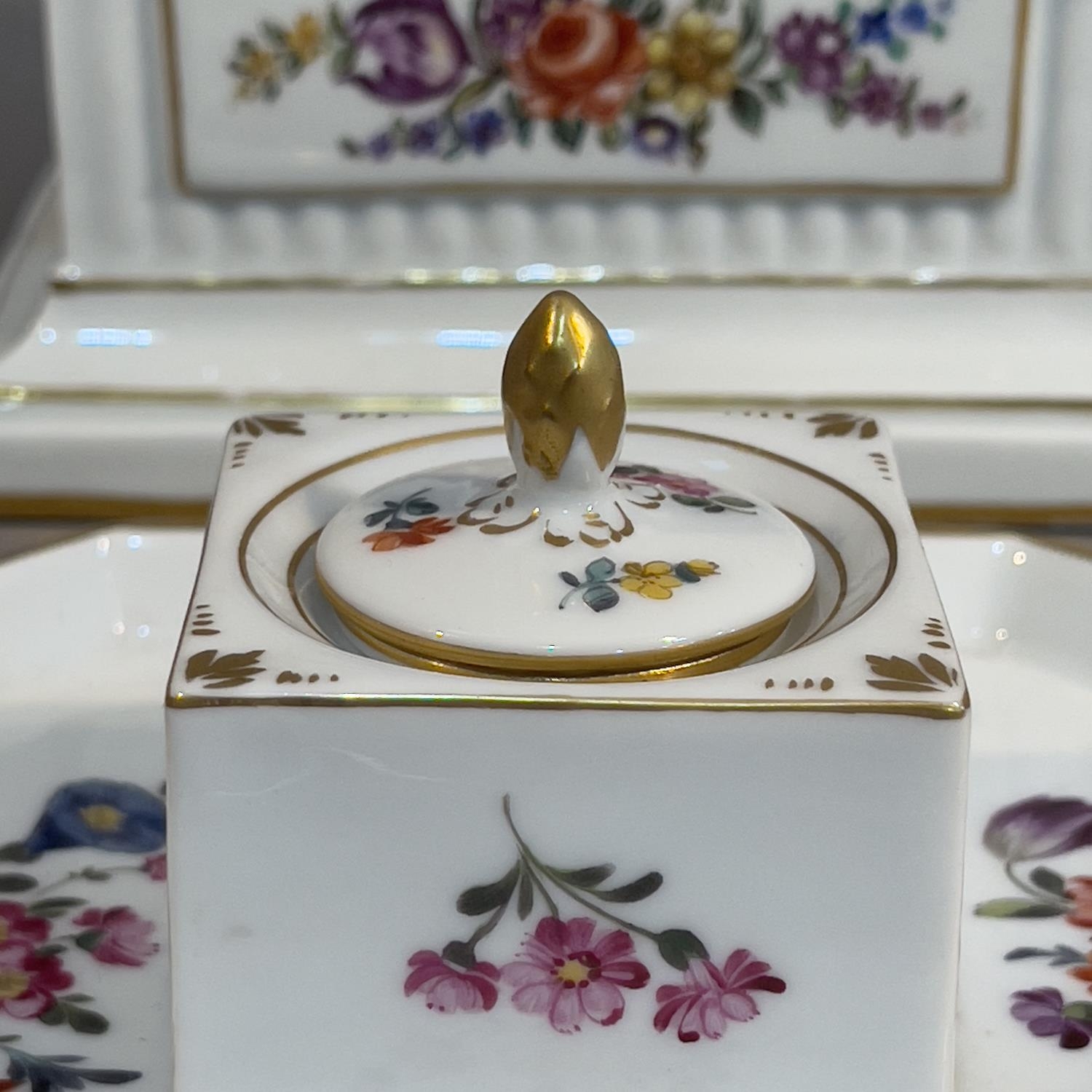 A 19th century Furstenberg porcelain stand of square outline, polychrome painted with a spray of - Image 2 of 4