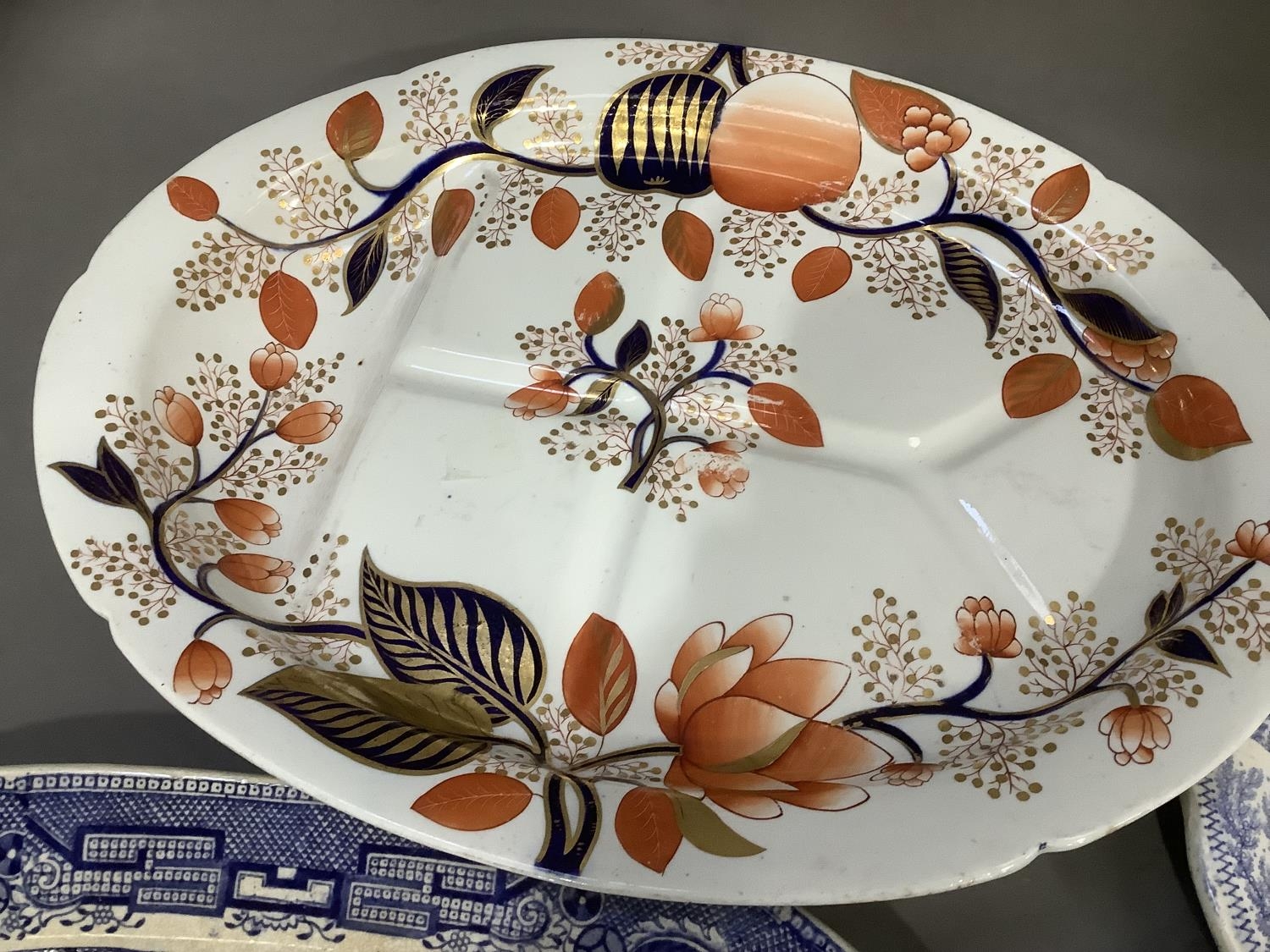 A collection of 19th century meat plates comprising an Albion dish 43cm wide, an Imari dish on feet, - Image 5 of 5