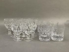 A set of nine small wine and five whisky tumblers of slice cut