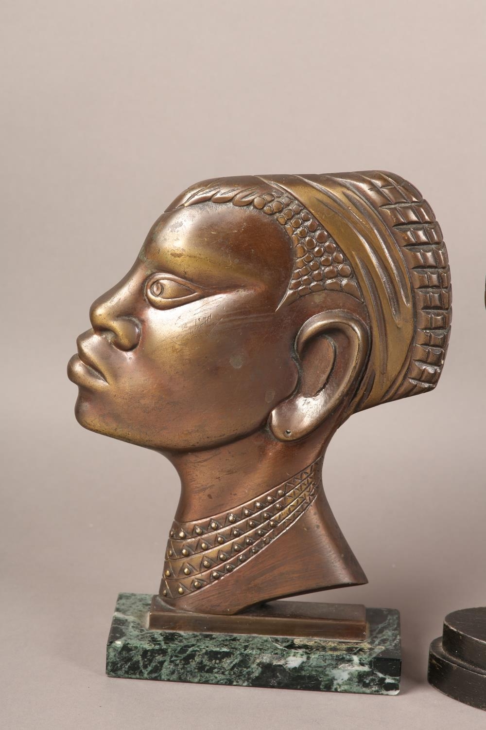 Two early 20th century bronze profiles of an African tribesman and woman, after Hagenau, coppered - Image 2 of 4