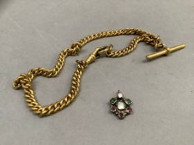 An early 20th century watch chain in gilt base metal curb links with T-bar and swivel fastener,