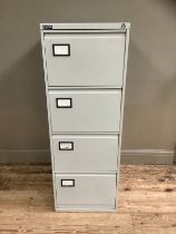 A grey metal filing stack of four drawers