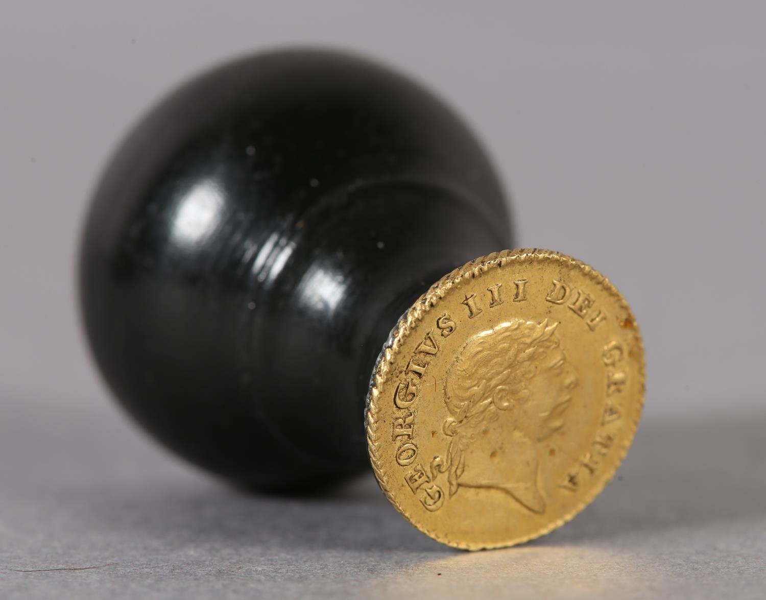 An ebony seal with a George III one-third Guinea Matrix (the coin c1797-1813), 3cm high (Shipping - Image 3 of 4