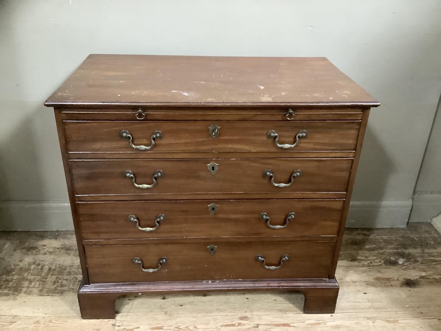 A mahogany bachelor's chest of four graduated drawers and on bracket feet, 92cm wide, 82cm high - Image 2 of 2