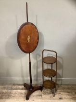 A 1920s three tier folding cake stand together with a mahogany pole screen the oval banner cross