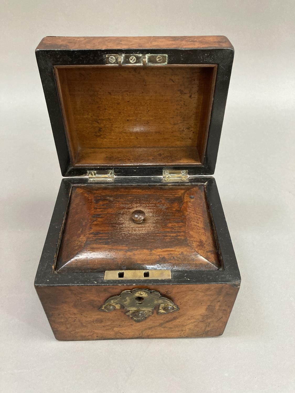 A 19th century walnut tea caddy having cut gilded metal and ivory applied cartouche and gilt metal - Image 3 of 3