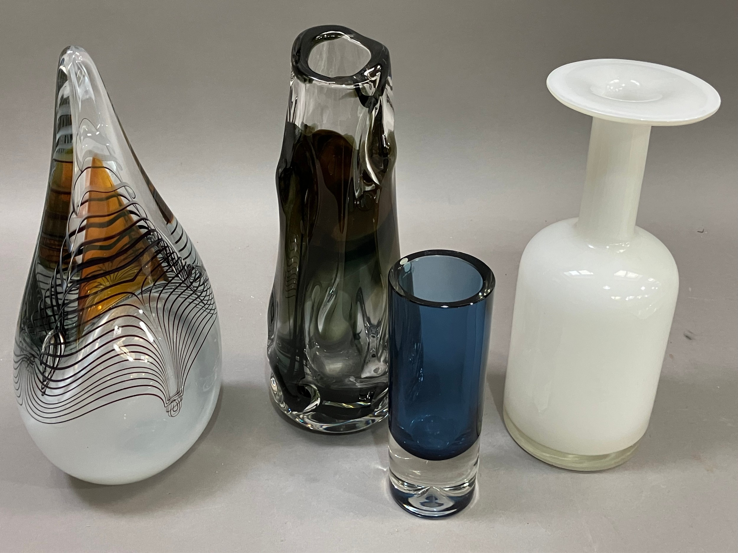 A collection of art glass including a Whitefriars knobbly smoked glass vase, a Polish glass