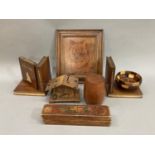 A pair of bookends formed as treen books and a bowl, together with a teak barrel holder, musical