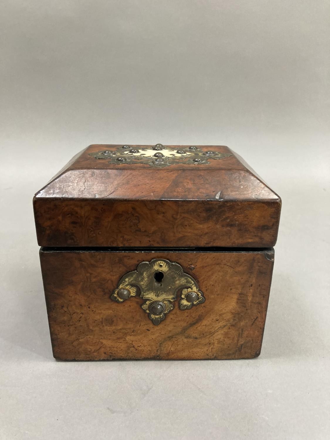 A 19th century walnut tea caddy having cut gilded metal and ivory applied cartouche and gilt metal - Image 2 of 3